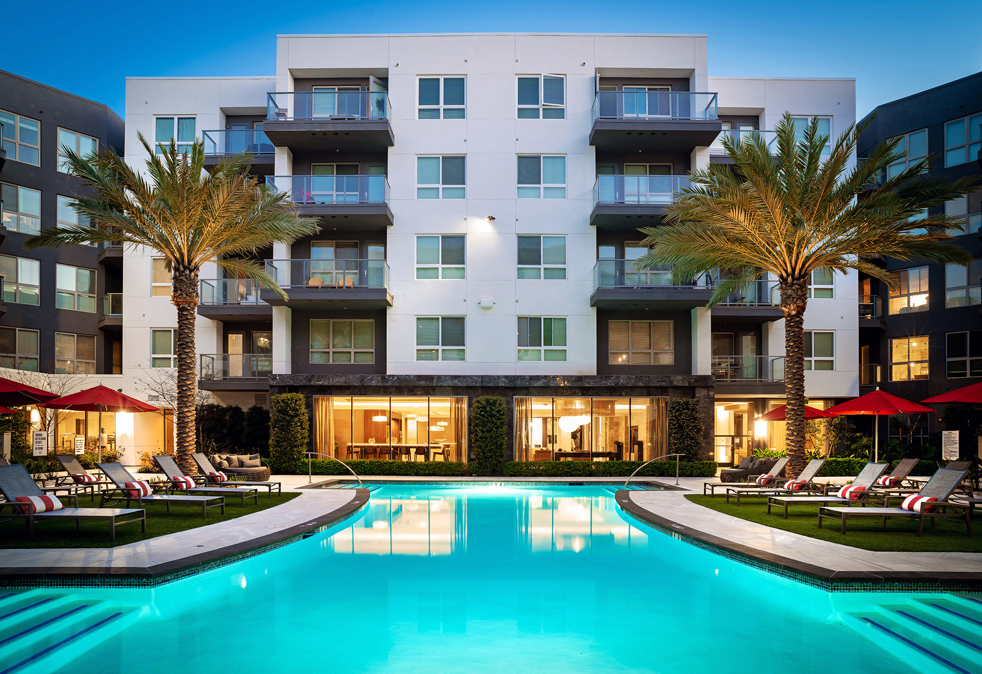 Resort-style pool with palm trees