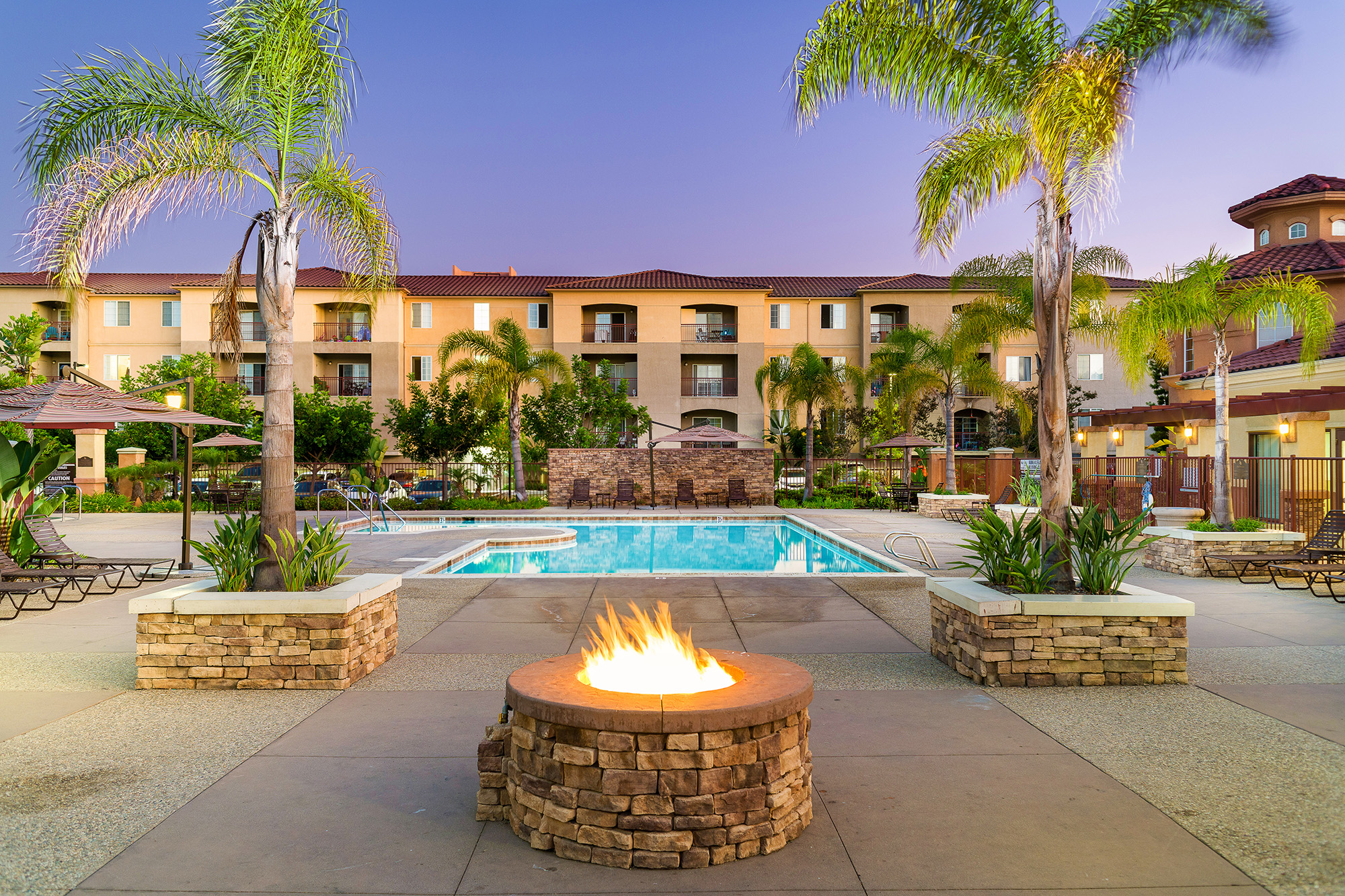 Fire pit and resort-style pool at Greenfield Village San Diego